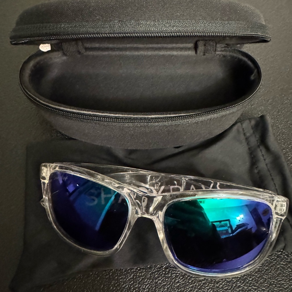 Shady Rays Clear Frame Unisex Sunglasses with Blue-Green Lenses